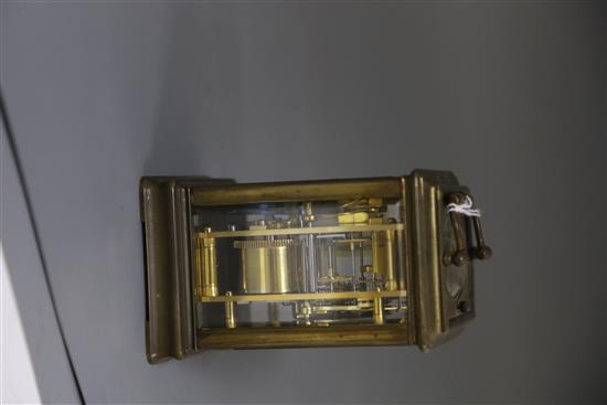 A late 19th century French lacquered brass hour repeating carriage clock, width 3.5in. depth 3.25in. height 5.5in.